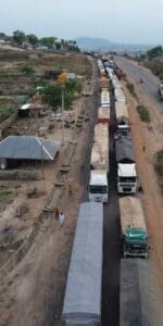 Long line of trucks trapped in gridlock at Amukpe Roundabout in Delta State