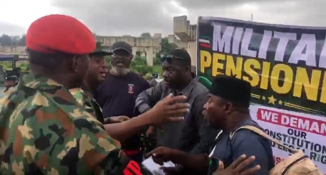 Military veterans protest over pension adjustments at Defence Ministry in Abuja