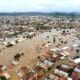Floodwaters covering a road in Nigeria amid calls for proactive flood prevention