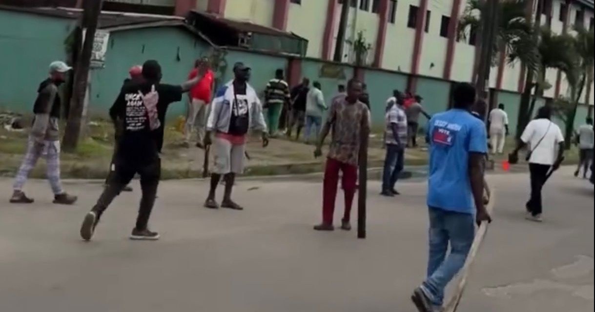 People on a road in Effurun during the unrest on 18 September 2026