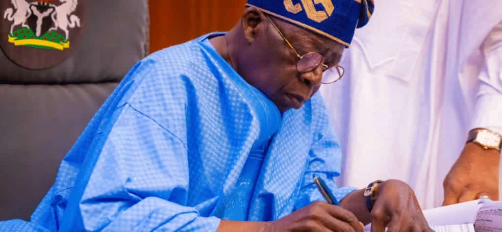 President Bola Tinubu and officials at the new NDPC headquarters in Abuja