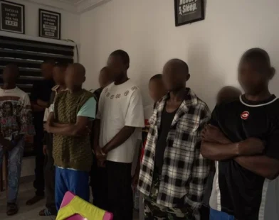 Suspects and rescued individuals linked to Ghana cybercrime centre operation