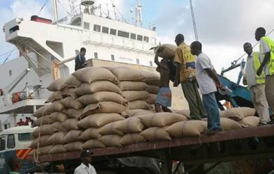 Nigerian farmer working on a farm as food import spending rises