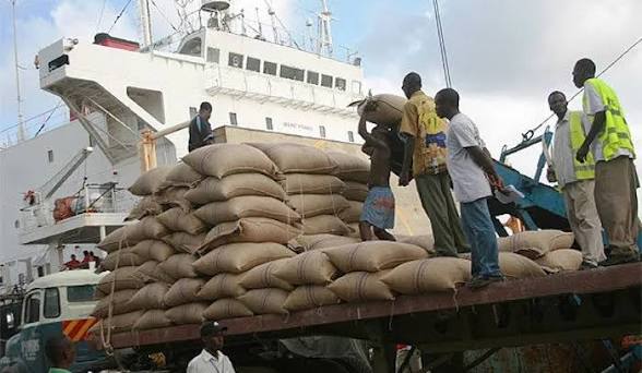 Nigerian farmer working on a farm as food import spending rises